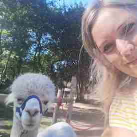 Woman's selfie with alpaca